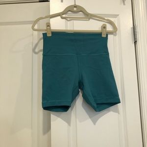 Turquoise Lululemon biker shorts
